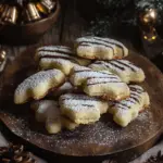 Nougat-Spitzbuben - M&uuml;rbe Pl&auml;tzchen mit Nougat